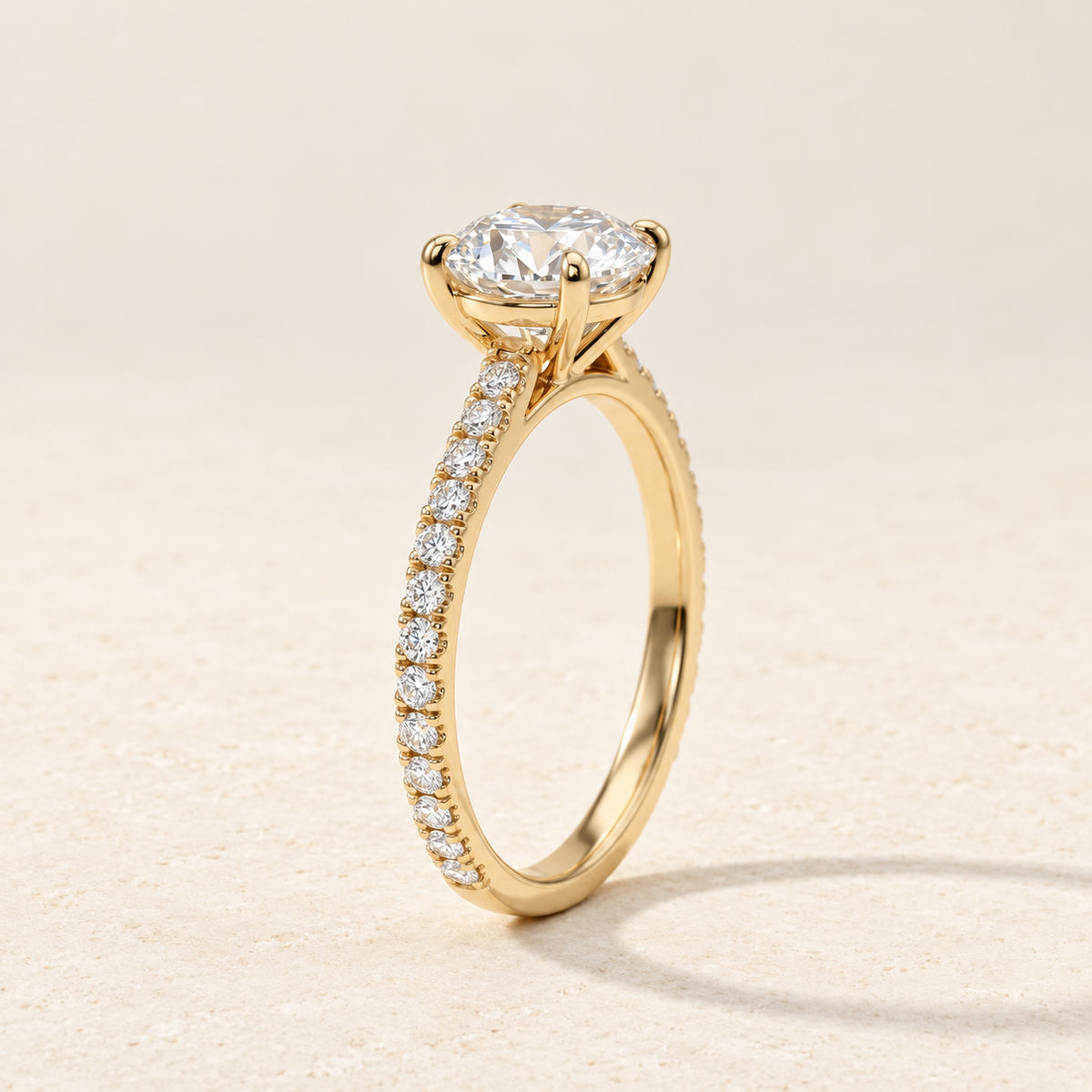AI-generated visualization — 1 ct Lab Diamond Pavé Engagement Ring in yellow gold, warm ivory studio display