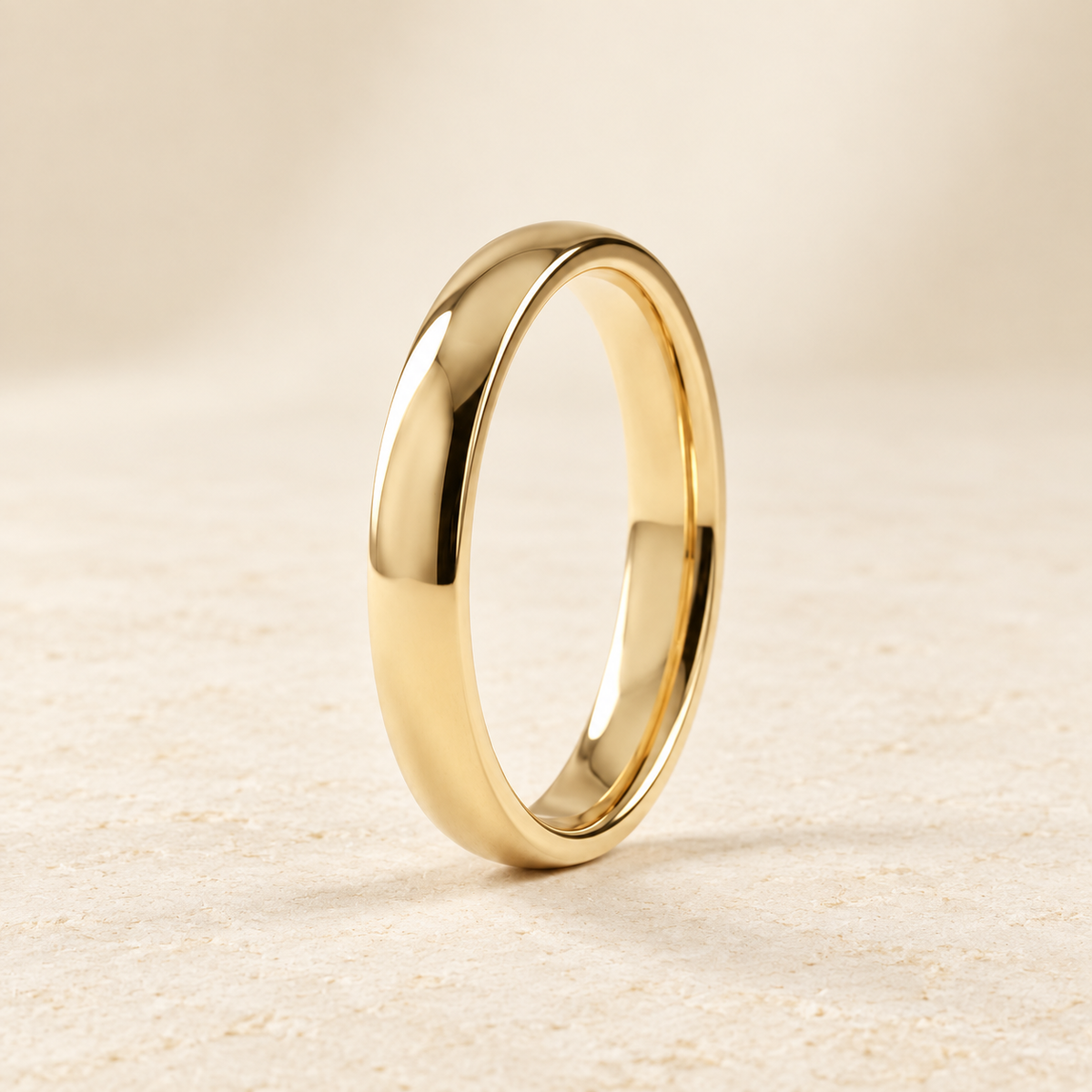 AI-generated visualization — Classic Comfort-Fit Band — 2.5 mm in yellow gold, warm ivory studio display