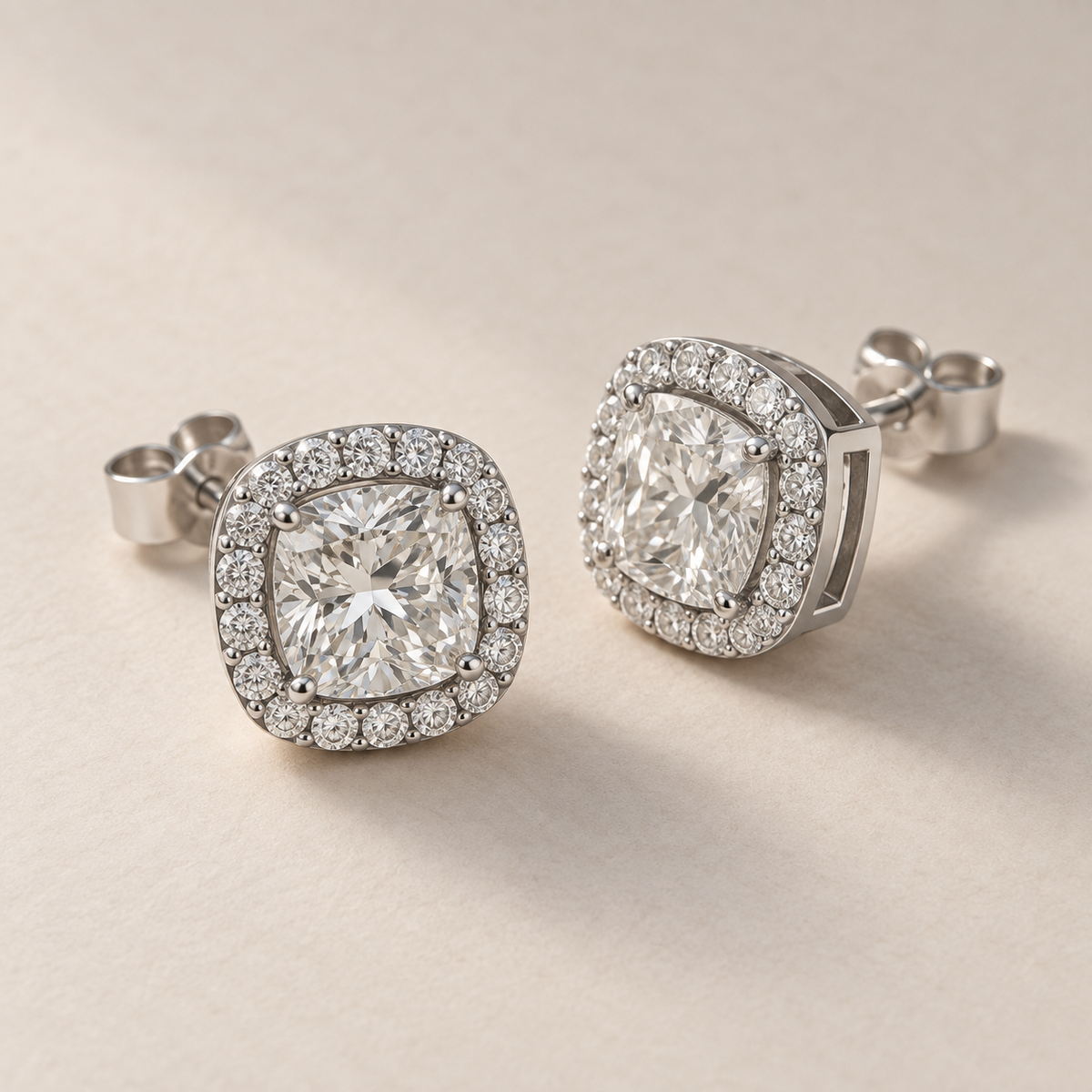 Cushion Halo Lab Diamond Stud Earrings in white gold, three-quarter view