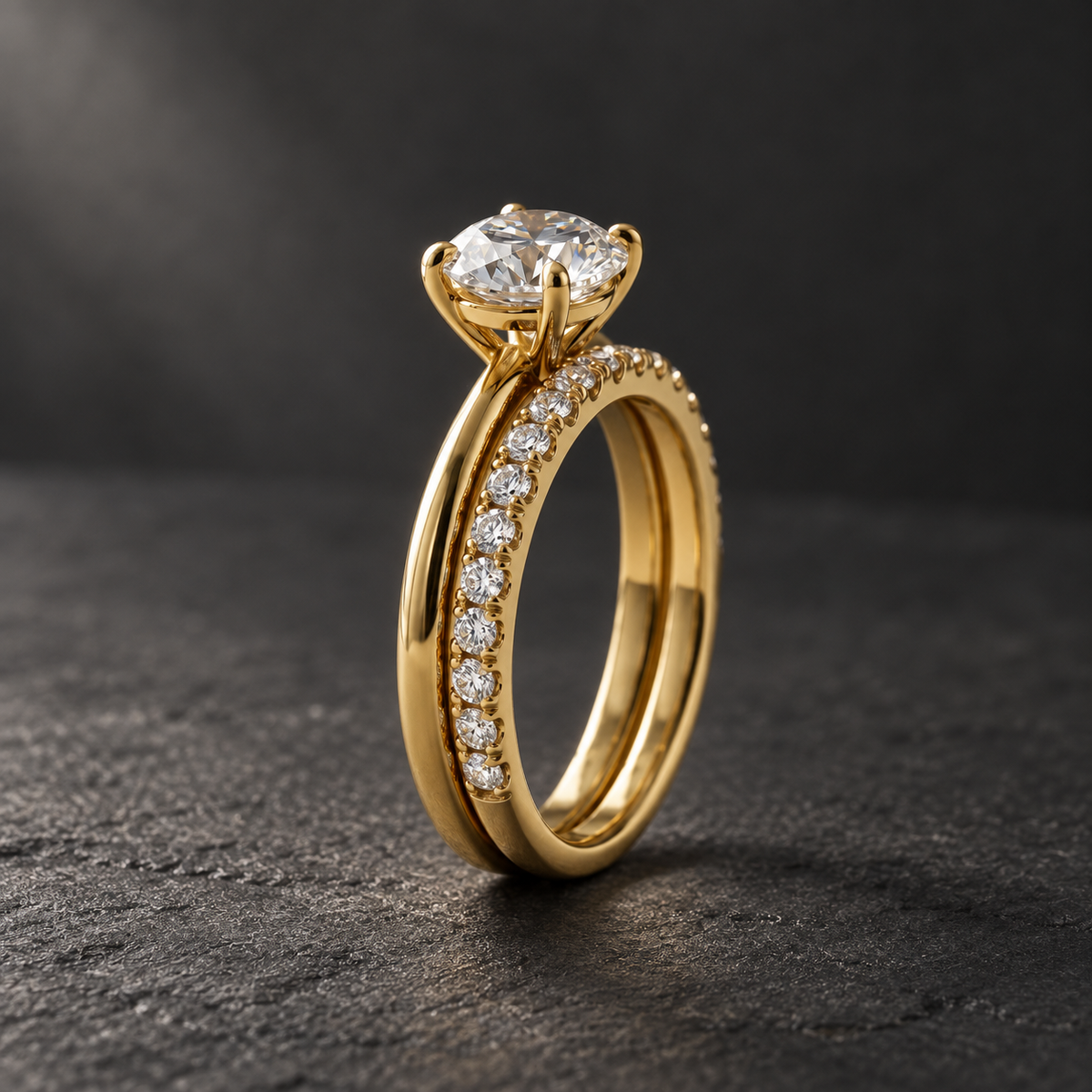 AI-generated visualization — Featherline Lab Diamond Bridal Stack in yellow gold, dark graphite editorial setting