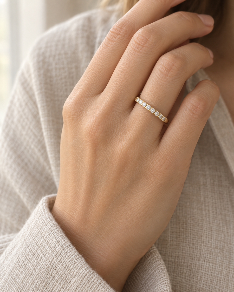 AI-generated visualization — Lab Diamond Half-Eternity Pavé Band in yellow gold, half-eternity band on an adult hand