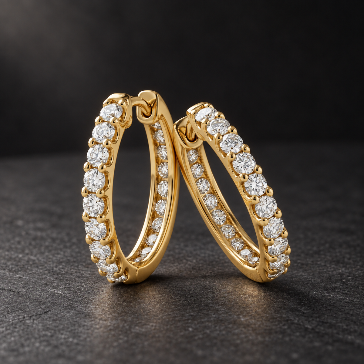 AI-generated visualization — yellow-gold Inside-Out Huggie Hoops displayed against dark graphite.