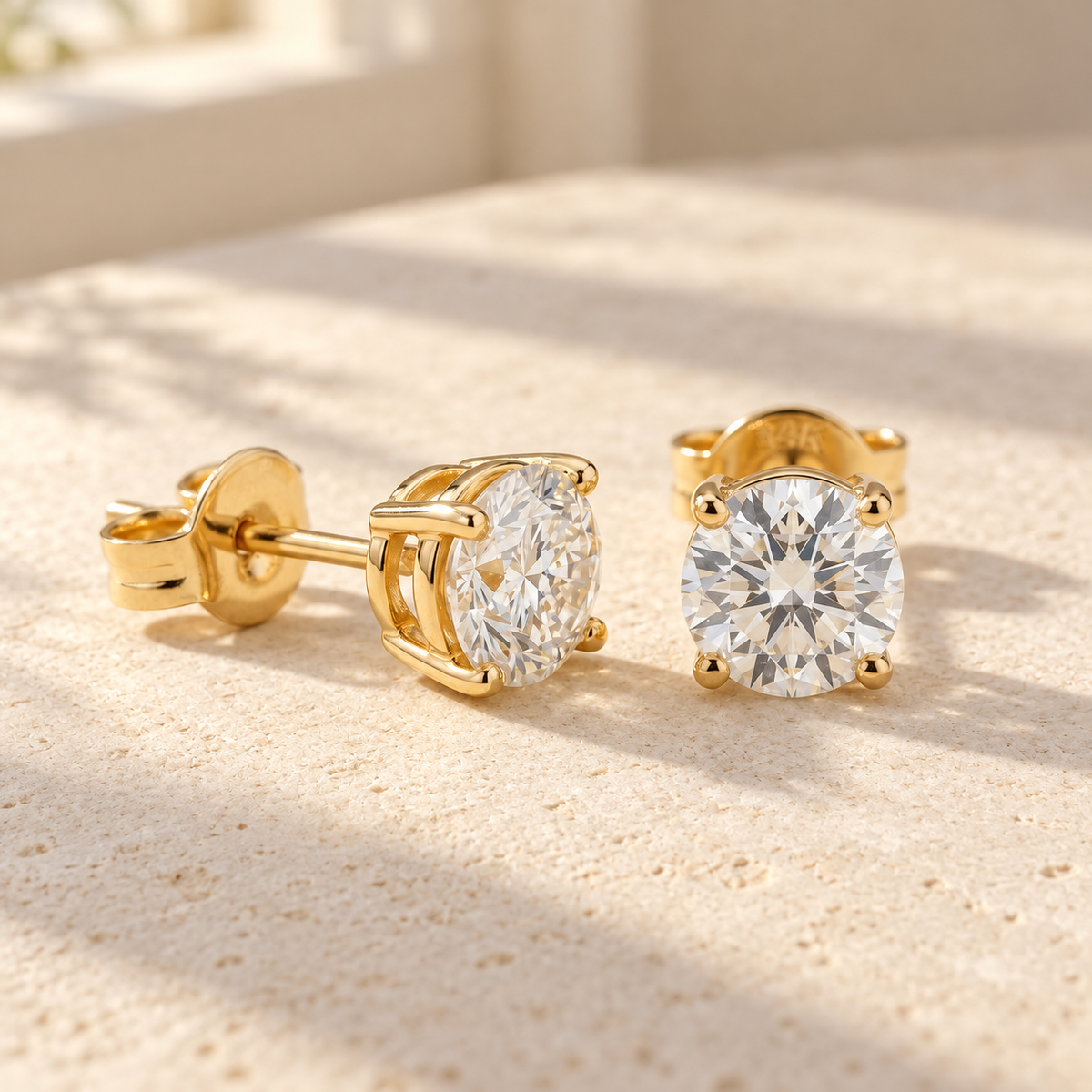 AI-generated visualization — yellow-gold Lab Diamond Stud Earrings on a warm tabletop in natural window light.